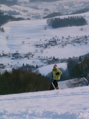 Off-piste skiing behind the house